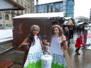 Braving the snow and freezing cold temperatures in just our underwear to raise money in a street collection. 